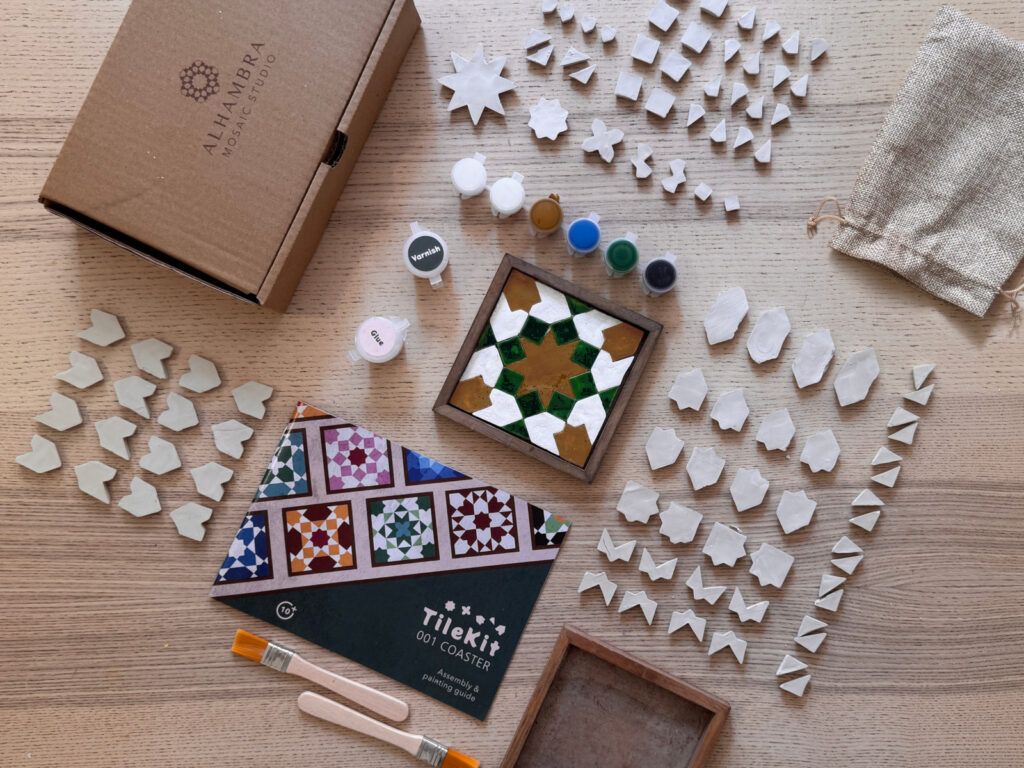 Kit contents with a coaster painted in the Alhambra / Seville palette