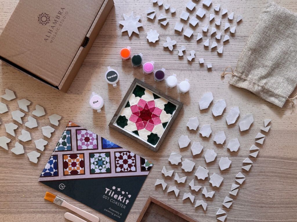 Kit contents with a pink coaster in the Florals palette